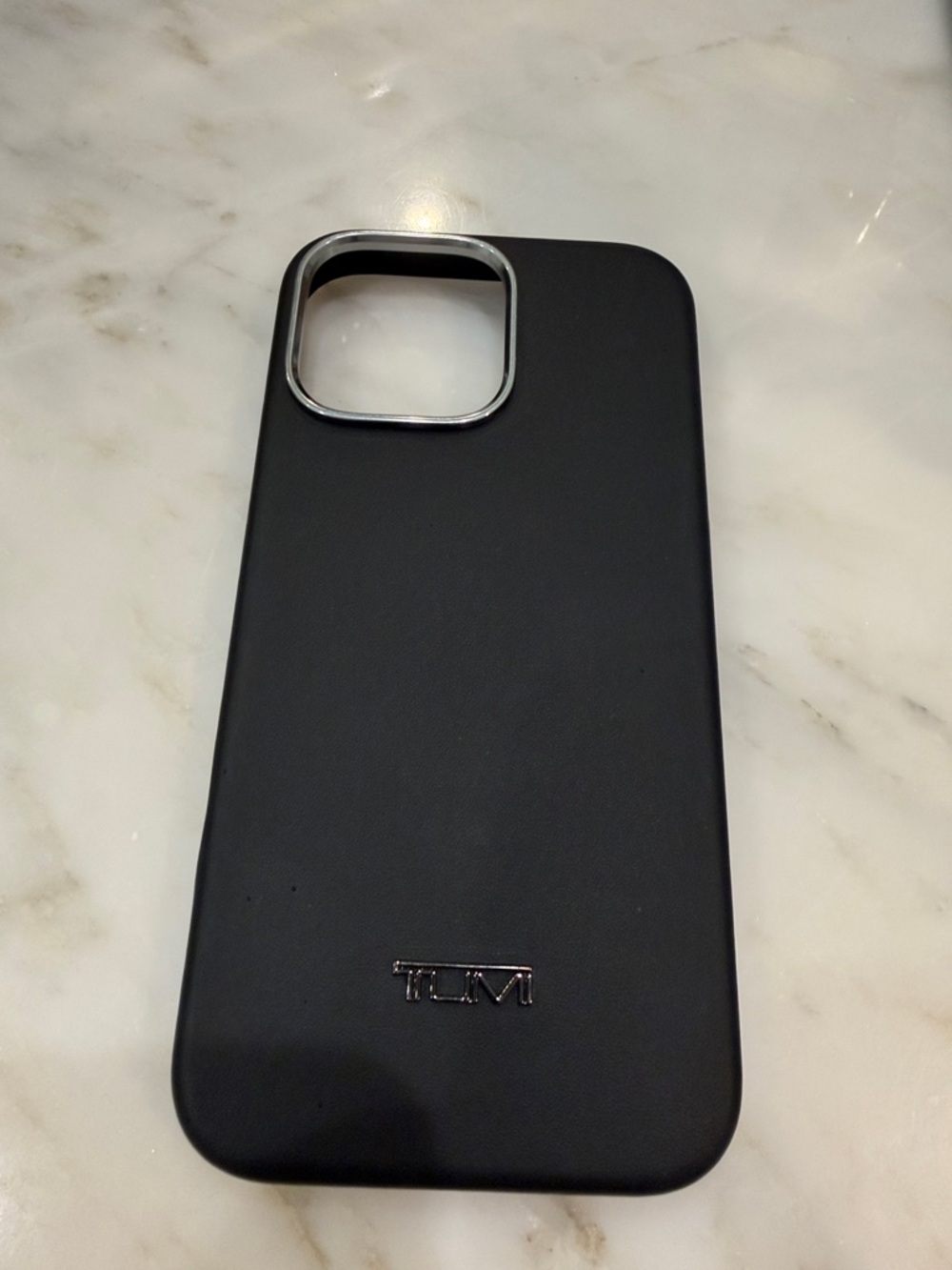 Tumi Black Phone Case with Silver Camera Bezel 16 Pro Max